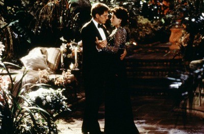 Sabrina (Julia Ormond) dances with Linus Larrabee (Harrison Ford) in the romantic film.