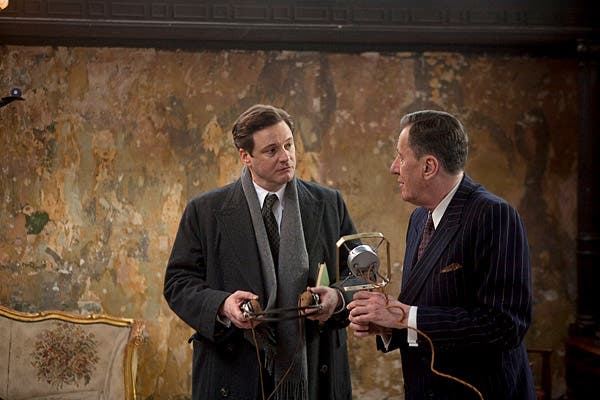 Colin Firth as King George VI with his speech therapist, Dr. Lionel Logue (Geoffrey Rush) in the critically-acclaimed British drama.