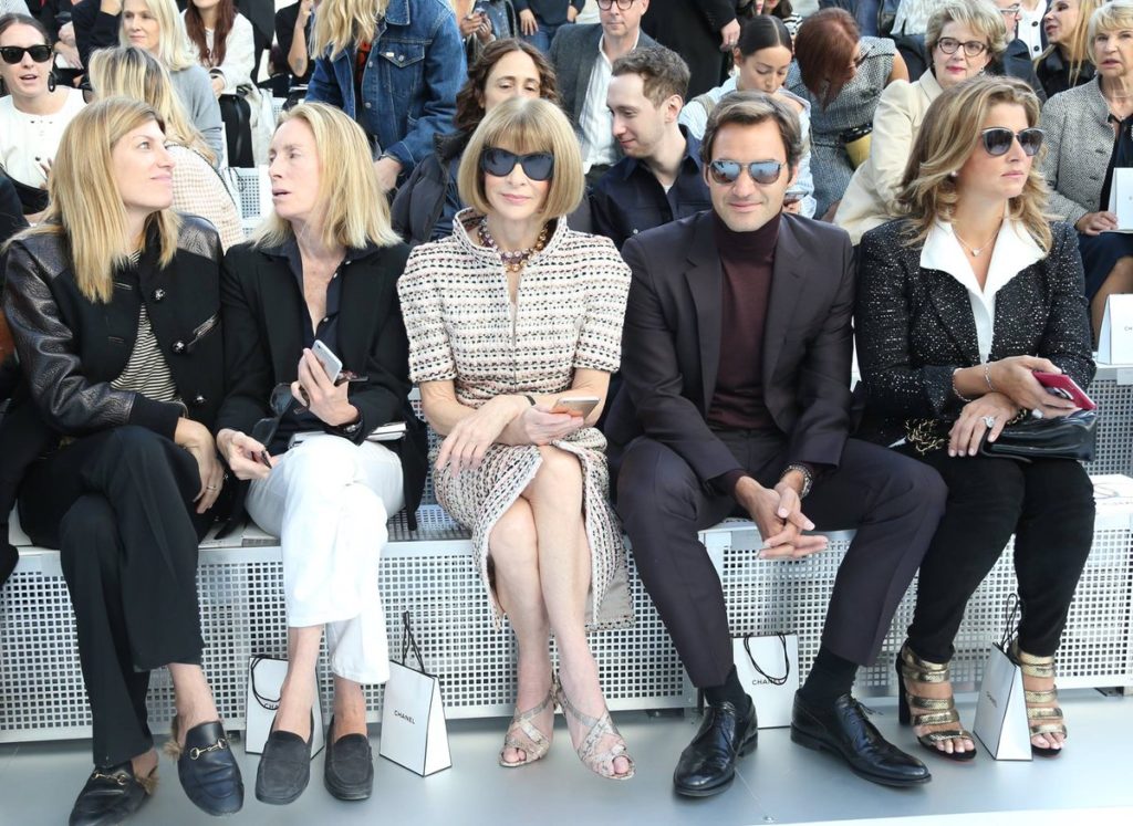 Anna Wintour sits on the front row of the Chanel show with Roger Federer and his wife, Mirka.