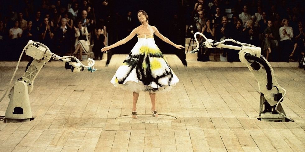 The infamous "paint dress," spray painted live at the Spring/Summer 1999 show while the model was spun on around on a stand.