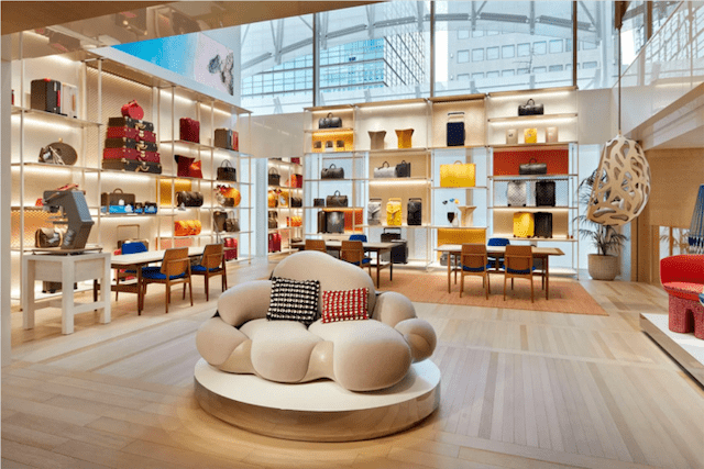 Louis Vuitton's New York flagship, with pieces from artist Jun Aoki. Louis Vuitton frequently brings in artists to redesign their stores for the season in order to create a unique customer experience.