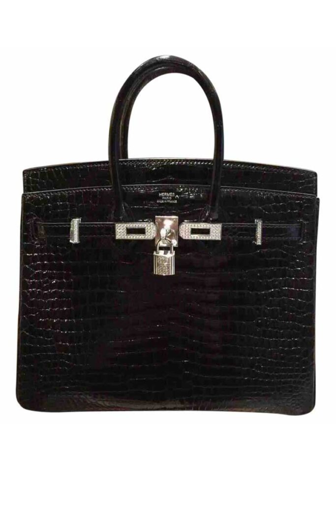 Hermès Birkin 35 in black crocodile and diamonds; $200,000, Vestiaire Collective.