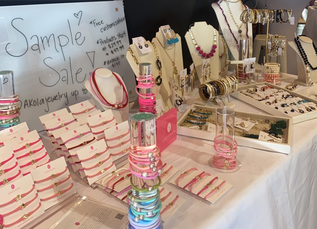Jewelry table featuring a sample sale during the event