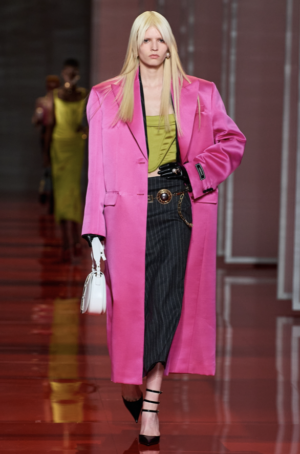 Colorful trench coats, taken from the recent men's ready-to-wear collection, flooded the runway.