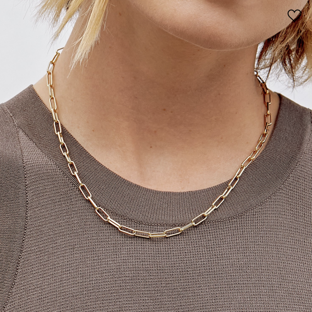 A cult classic from the brand featuring dainty chain links and a circular clasp closure.