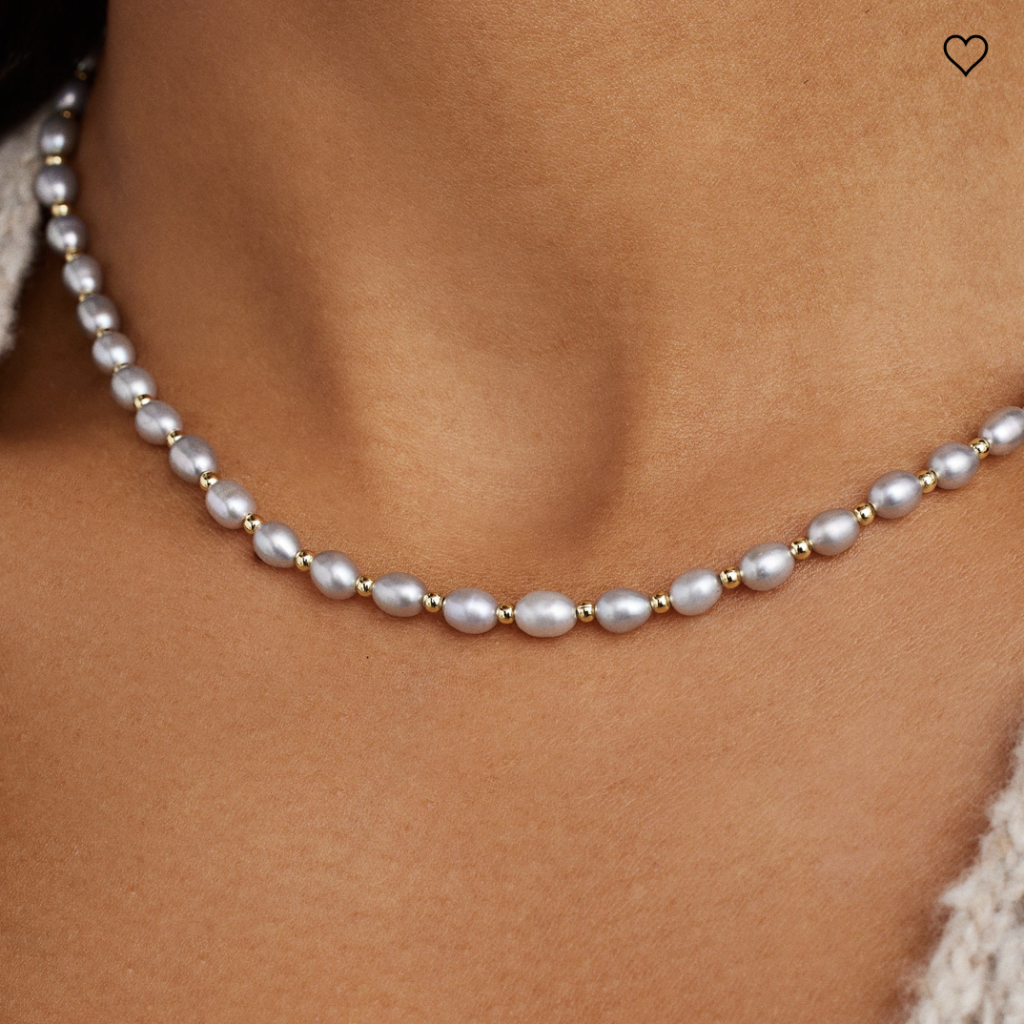 Created with the ocean in mind, one of the newest pieces from the March 2022 collection brings the California sea to you with dainty pearls and gold beads.