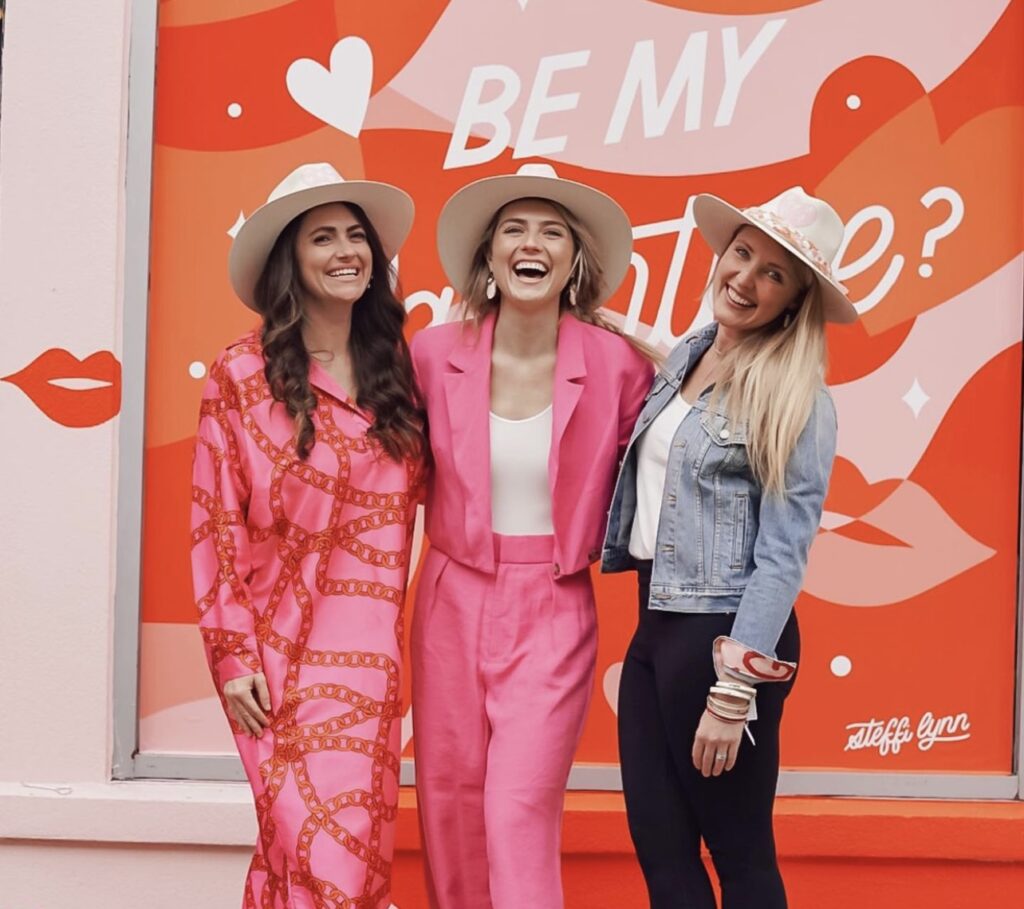This past February, Tinsley poses with friends during a pop-up event for Galentine's Day.